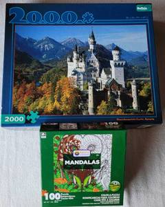 lot 215 image: ASSORTED PUZZLES AS SHOWN.