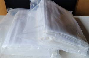 lot 219 image: KING SIZE WHITE HIGH THREAD COUNT 60% ORGANIC REGENERATED COTTON 40% POLY SATEEN DOBBY STRIPE PILLOWCASES. 40L x 20W 12 PER PACK (YOUR BID X 2)