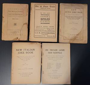 lot 248 image: LOT OF 5 ANTIQUE BOOKS AS SHOWN. RED WAGON STORIES, 1904, ON A FAST TRAIN THROUGH TEXAS - 1905, NEW DUTCH JOKE BOOK - 1907, ONE THOUSAND LAUGHS FROM VAUDEVILLE - 1908, NEW ITALIAN JOKE BOOK - 1909. CONDITION VARIES.