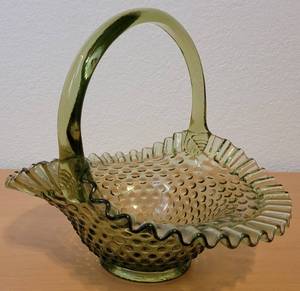 lot 2 image: Vintage Fenton Hobnail Olive Green Glass Ruffled Edge Basket as shown. Approx. 10 W x 8.25 D x 8.5 H.