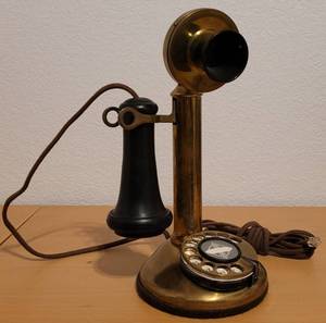 lot 7 image: Vintage GEC Candlestick Heavy Brass Telephone patented in 1915 as shown. Approx. 6 W x 12 H.