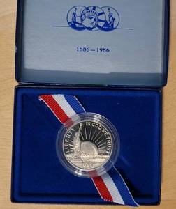 lot 19 image: United States Statue Of Liberty-1986 Ellis Island Silver Half Dollar Coin as shown.
