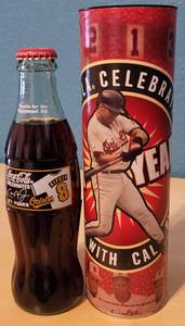 lot 20 image: Cal Ripken Jr Coca-Cola Bottle With Commemorative Tube as shown.