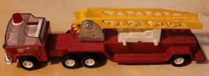 lot 26 image: Vintage Buddy L Corp Fire Truck made in Japan as shown. Approx. 10.5 long.