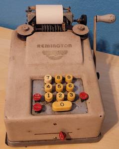 lot 34 image: Vintage 1940s Remington Hand Crank Adding Machine as shown.