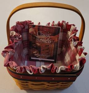 lot 40 image: 2001 Longaberger Small Berry Basket RedWhite Plaid Liner With Protector as shown. Approx. 6.5 W x 7 H.