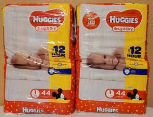 lot 50 image: Lot of 2 Packaged Huggies Snug & Dry Diapers as shown. (Your Bid x 2)