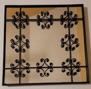 lot 56 image: Heavy Wrought Iron Framed Mirror as shown. Approx. 18 W x 18 H.