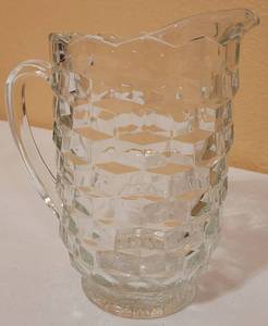 lot 75 image: Vintage Fostoria Glass Pitcher as show. Approx. 7.75 W x 8.5 H.