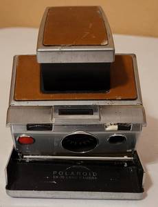 lot 83 image: VINTAGE POLAROID SX-70 LAND CAMERA AS SHOWN.