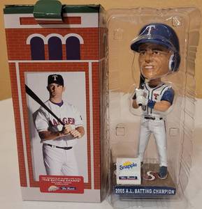 lot 84 image: 2005 COMMEMORATIVE MICHAEL YOUNG TEXAS RANGERS BATTING CHAMPS BOBBLE HEAD FIGURE WITH BOX AS SHOWN.