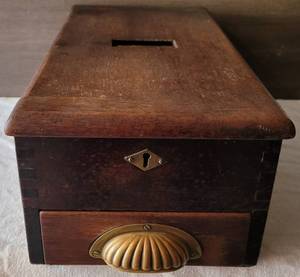 lot 116 image: VINTAGE WOODEN CASH BOX WITH ORIGINAL MECHANISM. THIS BOX STILL RINGS WHEN DRAWER IS OPENED. MARKED LITTLE CHAMPION CASH TILL DUDLEY & CO - HOLLOWAY NO. 7 AS SHOWN. APPROX. 8.25 W x 15.25 D x 6 H.