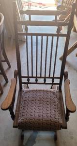 lot 131 image: OVER 140 YEARS OLD ANTIQUE 1870S LATE VICTORIAN STYLE WOODEN ROCKING CHAIR WITH UPHOLSTERED SEAT IN STYLE, COLOR, AND CONDITION SHOWN. APPROX. 23 W x 28 D x 45 H. PATENTED MAY 1876. SEE PICTURES