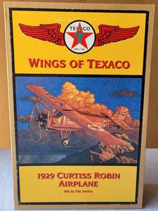 lot 157 image: 1998 WINGS OF TEXACO 1929 CURTISS ROBIN AIRPLANE DIE CAST METAL COIN BANK IN ORIGINAL BOX AS SHOWN.