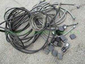 lot 102 image: Assorted circuit breakers, power cords and electrical cord covers
