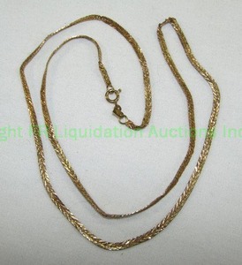 lot 144 image: 14K Italian Chain. Kinked and Twisted. Clasp marked 14K Italy OR Approx 20L