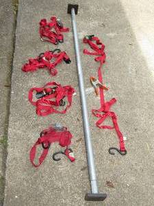 lot 104 image: Adjustable Cargo support bar and straps