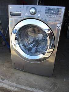 lot 14 image: L.G. 27 Inch 4.5 cu. ft, Front Load Washer- With Steam, Smart Thin Q (Wi-Fi),   Model  WMHV70WA