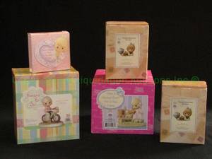 lot 126 image: Precious Moments collectibles in original boxes
