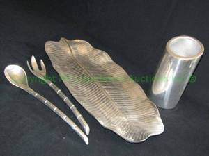 lot 129 image: Sandcast aluminum serveware