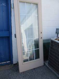 lot 151 image: Exterior Door With Center Glass Core 32 x 80H With Hinges