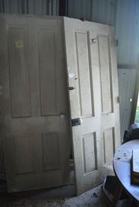 lot 34 image: Two 30x79 Solid Wood 4 Panel Doors with Vintage Locks and Porcelain Handles