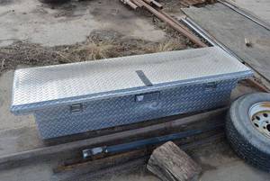 lot 12 image: Tractor Supply Truck Bed Tool Box 14T x 21D x 61 inside and 70 where it sits on truck, Plus  contents