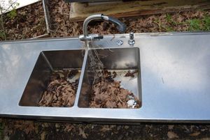 lot 103 image: Stainless Steel Sink Top 77 x26  -Double Sink  with Flex Sprayer
