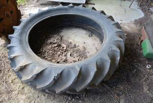 lot 161 image: Old Tractor Tire, great for sand box or Planter  15.9-36