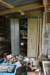 lot 222 image: Metal Cabinet full with Automotive Service Manuals