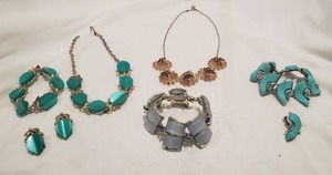 lot 230 image: Thermoset mid century fashion jewelry group. Includes an unusual aqua iconic 1950s color thermoset bracelet and single clip earring and an early plastic station flower necklace w Bakelite accents c. 1930s