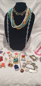 lot 231 image: Fashion jewelry group - includes necklaces, dyed shell necklace, RedWhiteBlue rings & clip earrings and more. Mostly complete, unbroken pieces