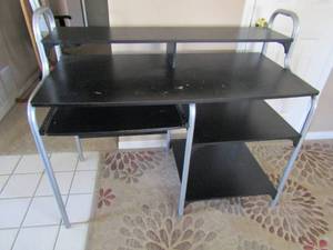 lot 104 image: Contemporary metal frame wood desk 35x48x23 4 tier shelving 1 pull out for keyboard