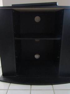 lot 107 image: Black TV stand 2 tier shelving with storage 28x31x17