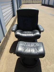 lot 209 image: Eames style black leather glider that reclines and swivels w matching ottoman