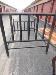 lot 15 image: Full size black metal bed frame with head and foot board, mattress rails