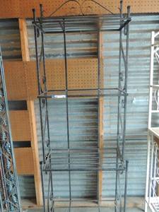 lot 24 image: Black multi tiered bakers rack 74x23x12