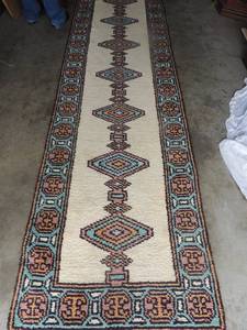 lot 36 image: NAVAJO Wool hall runner rug featuring a border and repeat center pattern 15 FT X 35