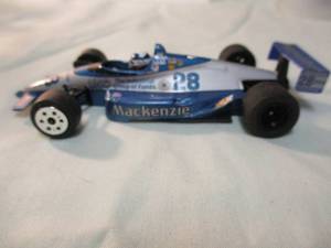 lot 46 image: 1990 ONYX-Lola, 143 Scale,  Indy 500, #28- Scott Goodyear, Mackenzie Cart Sport Racing Diecast Car. Portugal
