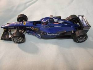lot 76 image: 1999 Minichamps -143 scale, Indy 500, Prost Peugect APO2, Play Station, Cart Sport Racing Diecast Car.