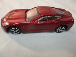 lot 116 image: Burago-143 Scale, 2014 Corvette Stingray Diecast Car, Made In China  #11813