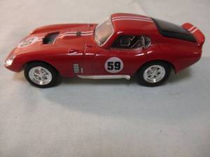 lot 180 image: ROAD Signatures-143 Scale, #94242, Red, 1965 # 59-Shelby Cobra, Daytona Coupe, Diecast Car
