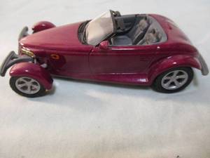 lot 208 image: UNIVERSAL HOBBIES, 143 scale, Plymouth Prowler Diecast Car.