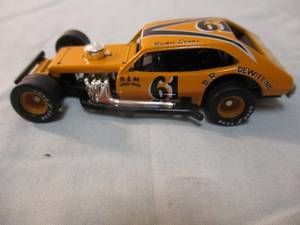 lot 216 image: ERTL- NUTMEG Collectables 70s Modified, 164 Scale, # 61, Diecast Car, 2187-U