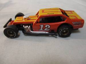 lot 228 image: ERTL- NUTMEG Collectables 70s Modified, 164 Scale, # 12, Diecast Car, 1434-U