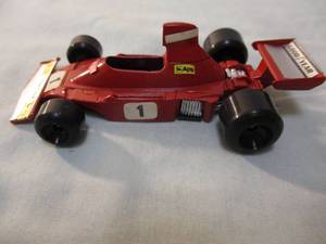 lot 311 image: POLISIL, Formula 1, #1,  RJ.2, FERRARI 312 B3 74, F-1 Racer Diecast Car, Made In Italy