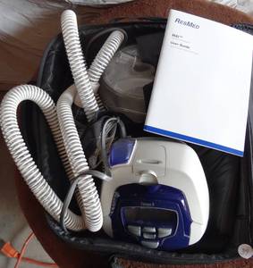 lot 39 image: ResMed S8 Escape II CPAP Machine in case with manuals and attachments