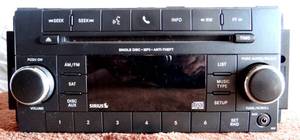 lot 42 image: P68252825AA Factory 2017 Jeep Wrangler Chrysler Dodge Am FM CD Sirius Radio - $$$