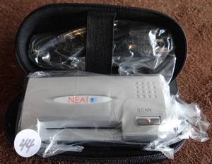 lot 44 image: PORTABLE NEAT RECEIPTS HANDHELD SCANNER - APPEARS UNUSED IN CASE
