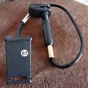 lot 67 image: CELLPHONE POSING WAND - CAN MOUNT TO DIFFERENT SURFACES WITH ADJUSTABLE CLIP - POSE AT ANY POSITION